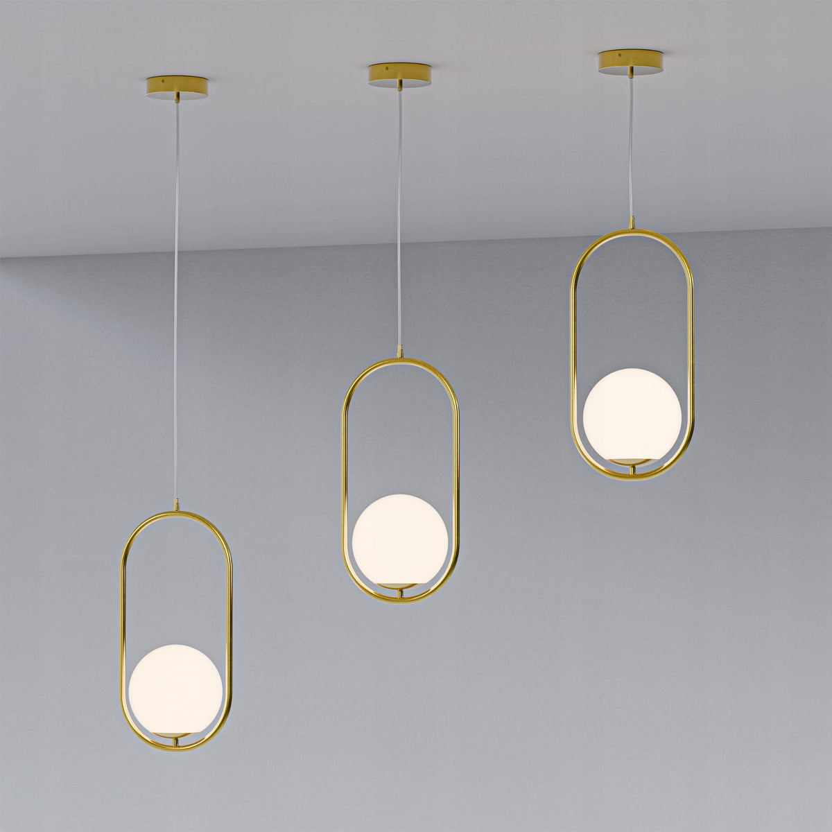 Orbitella Pendant Lamp with Spherical Shade in a Gold Frame, Modern Style – in a room setting
