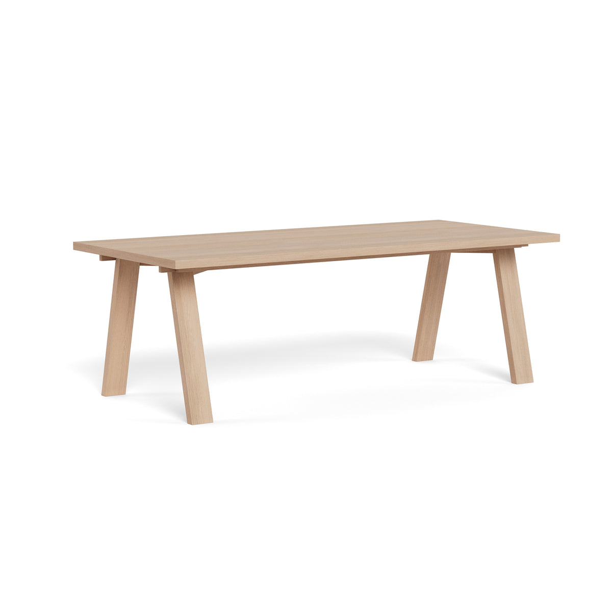 Lurisse dining table, 220x100x75, in bleached oak with slanted legs – a Scandinavian-style table, viewed from an angle