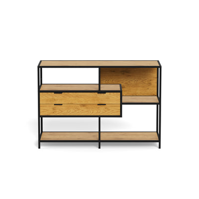 Skeleto low bookcase 114x78 Wild Oak – front view showing the asymmetrical shelves and the drawer unit