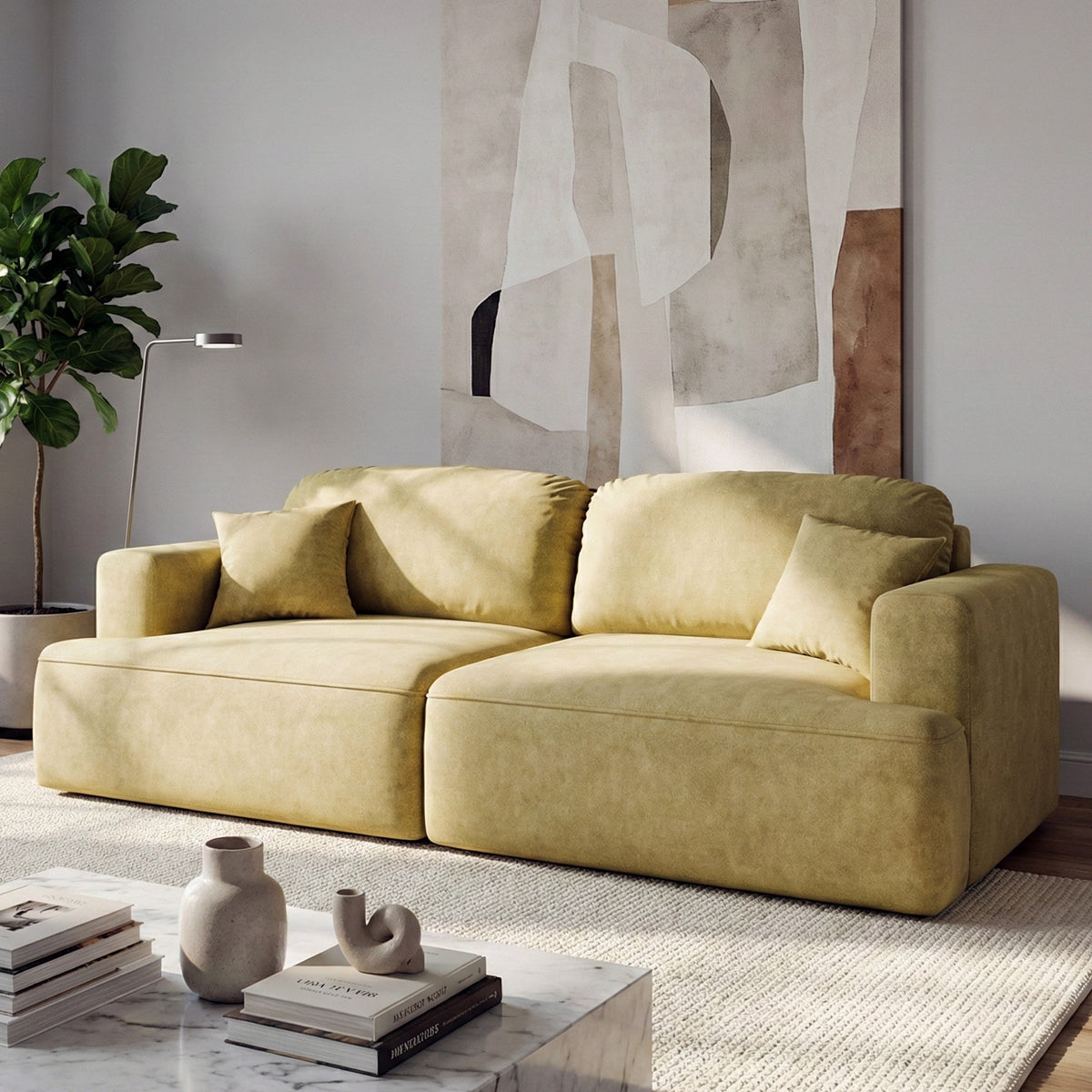 Senvali 241 cm sofa in Golden Sepia (CLOUD 32) in a bright living room with a plant, a painting and a marble coffee table