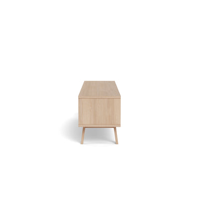 Lurisse TV cabinet 180x50, bleached oak – side view, low TV cabinet on slightly slanted legs